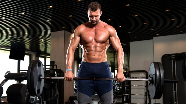 A person performing reverse biceps curl.